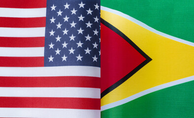 fragments of the national flags of the United States and the Republic of Guyana close-up