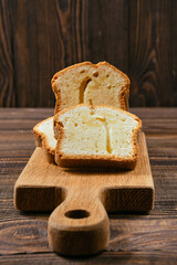 Closeup view of fresh biscuit cake with apple on the table
