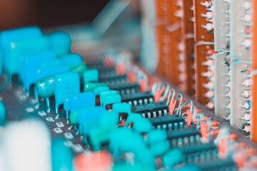 Vintage electronic circuit boards with radio parts and chips, close-up, macro photo