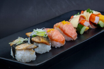 Mackerel, burned salmon Nigiri and crab stick cucumber tofu cheese sushi rolls