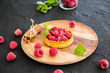 A healthy breakfast of cheese pancakes, berries, and honey. Creative atmospheric decoration