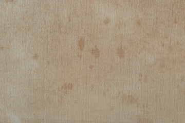 Delicate cream colored cloth surface with stains. for background and textured.