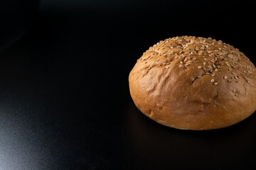 Bun, hamburger bread without ingredients. Concept for the production of fast food bread. Bakery products. Copy space
