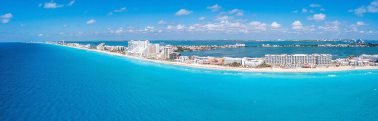 Aerial panoramic view of Punta Norte beach, Cancun, Mexico. Beautiful beach area with luxury hotels near the Caribbean sea in Cancun, Mexico. - obrazy, fototapety, plakaty