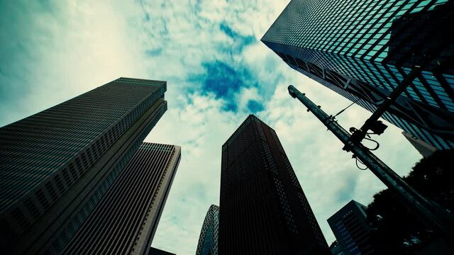 A timelapse of clowd at the building in the business town wide shot