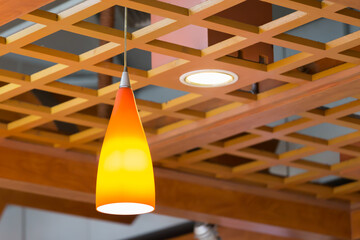 Hanging light on wooden celling