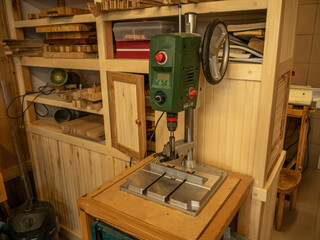 Equipment in a carpenter's workshop. Drilling machine.