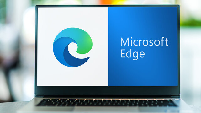 Laptop computer displaying logo of Microsoft Edge