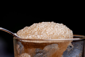Plantain seed shell or isabgol is a fiber obtained from plantain ovoid seeds, usually mixed with water and consumed to treat constipation. selective focus

