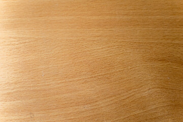 Abstract textured background of the surface of a wooden table.