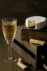brie cheese and a glass of white wine
