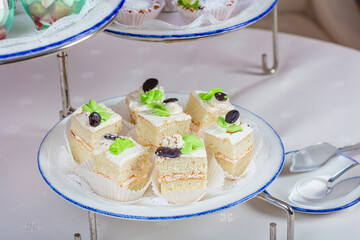 White sponge cakes with butter cream.
