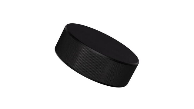Realistic looping 3D animation of the classic black ice hockey puck rendered in UHD with alpha matte