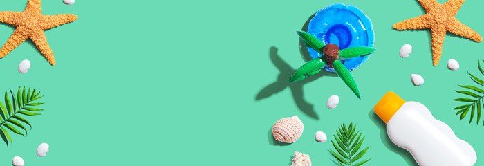 Sunblock bottle with starfish and seashells