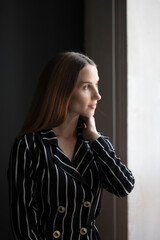 Portrait of a beautiful woman with a long brunette hair. brown-haired caucasian girl. Copycpase
