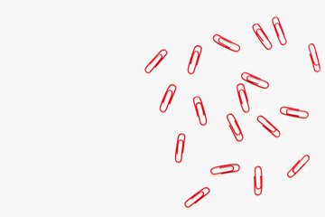 paper clips on a white background, stationery on a white background, paper clips 