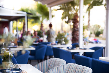 blurred background of a restaurant in the summer on the street