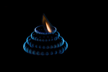 Flame of a gas burner on a black background