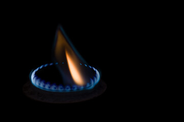 Flame of a gas burner on a black background