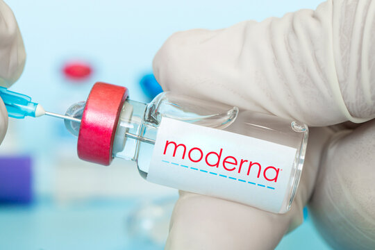 glass ampoule with a clear liquid on a blue background with the logo of a pharmaceutical company moderna