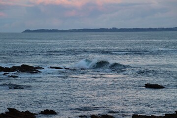 waves crashing on rocks