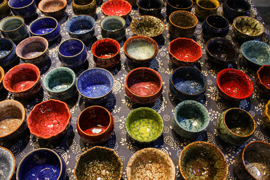 A lot of colorful ceramic bowls