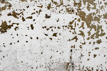 Texture of a concrete wall with cracks and scratches which can be used as a background