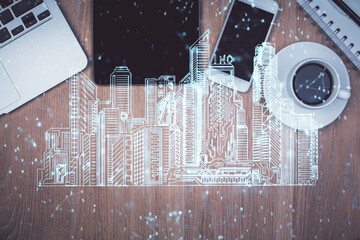Multi exposure of smart city technology drawing over table with phone. Top view.