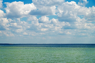 Cloudy sky over sea coast