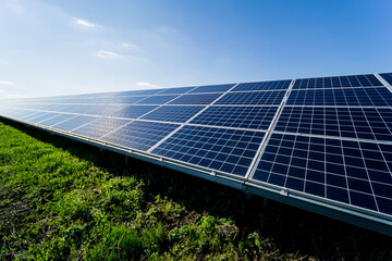 Photovoltaic solar panels on blue sky background