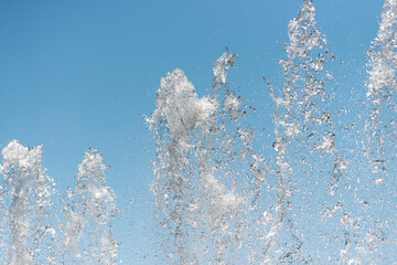 water fountain in the park - blue sky