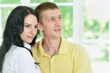 Close up portrait of pretty couple posing