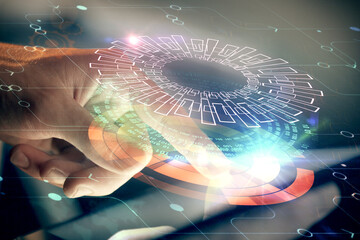 Multi exposure of man's hand holding and using a digital device and data theme drawing. Innovation...