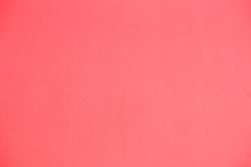 Red background. The texture of the cardboard.