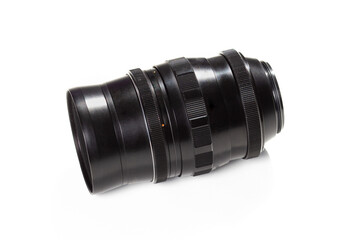 black old vintage camera lens on a white background.