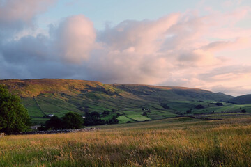 A view looking south over toward Burnsall and Thorpe Fell, in the Yorkshire Dales, North Yorkshire.