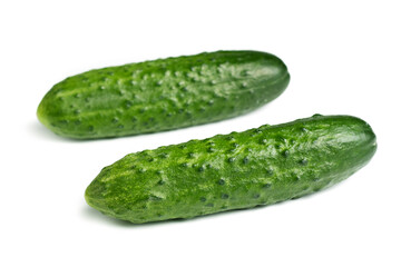 Fresh cucumbers isolated on white.
