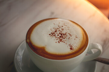 Latte art hot coffee in the morning at a cafe.