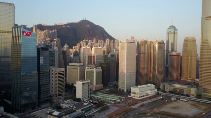 Fototapeta na wymiar Blurred all visible brands and logos. Aerial view of Hong Kong city at early morning time.