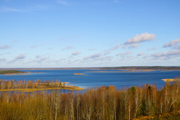Obraz premium View from above the lake. Beautiful autumn forest.