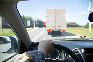 Railway crossing.Moving a car through a railway crossing.