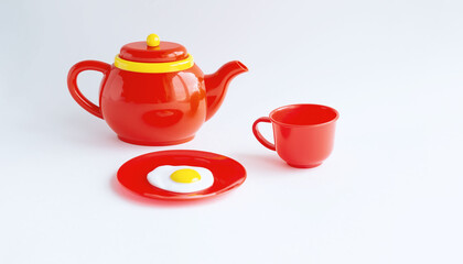 Children's bright red toy dishes - a teapot, a cup and a plate on a white background. A serving set of toy plastic dishes. Educational role-playing games for children. Breakfast time. Time to wake up