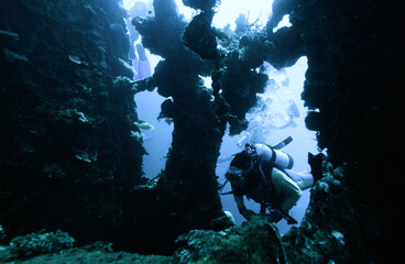 Diver Swimming through a Shipwreck in Truk Chuuk Lagoon Micronesia © Gary Peplow