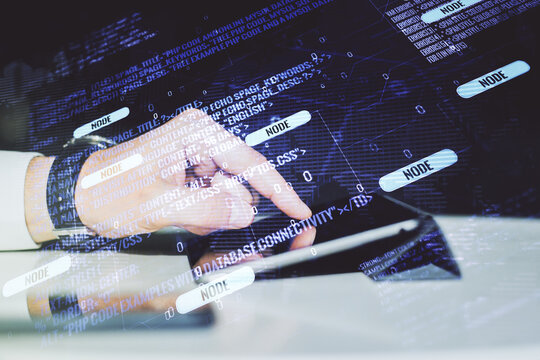 Multi exposure of abstract software development hologram with world map and finger presses on a digital tablet on background, global research and analytics concept