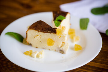 sweet baked cottage cheese casserole with nuts and candied fruits