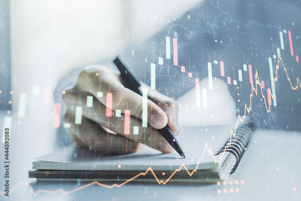 Poster multi exposure of abstract creative financial graph with world map and with man hand writing in note