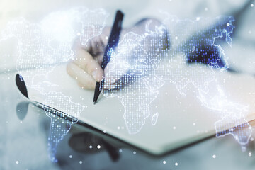 Multi exposure of abstract graphic world map and man hand writing in diary on background, big data and networking concept