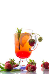 refreshing cool strawberry lemonade with lemon, ice and mint in a glass