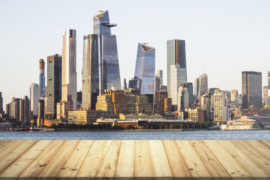 Table top made of wooden dies with beautiful Manhattan skyline on background, mockup