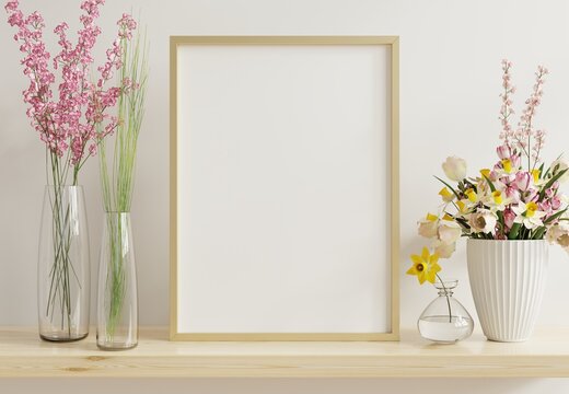 Interior poster mockup with vertical gold chrome frame in home interior background. © Vanit่jan